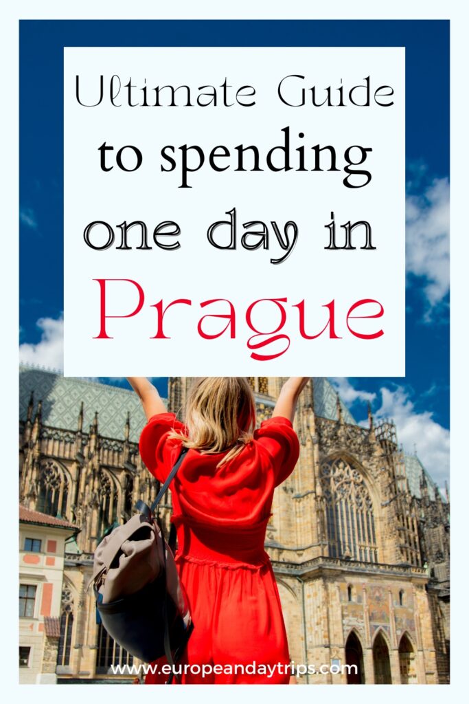 Pinterest pin titled 'Ultimate Guide to spending one day in Prague' featuring a woman in a red dress raising her arms in front of St. Vitus Cathedral. The background shows the detailed gothic architecture of the cathedral under a bright blue sky. 