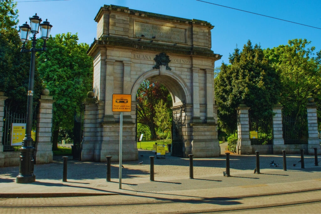 The Fusiliers’ Arch at the entrance to St. Stephen’s Green in Dublin, a stone structure framed by lush trees