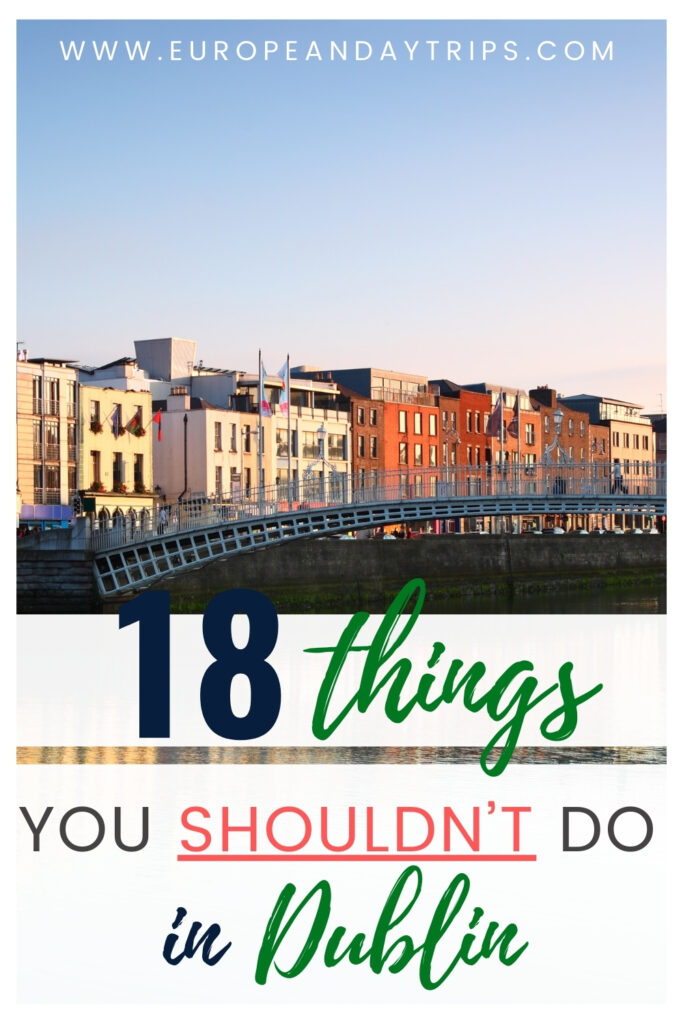 Pinterest pin titled “18 Things You Shouldn’t Do in Dublin” with a sunset photo of Dublin’s Ha'penny Bridge spanning the River Liffey and rows of colorful riverside buildings in the background.