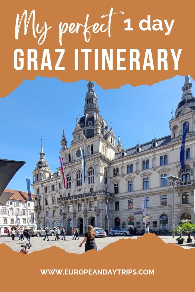 Graphic for a Graz travel post showing a grand historic building on a sunny day with people walking across the square in front. Text on the graphic reads "My perfect 1 day GRAZ ITINERARY"