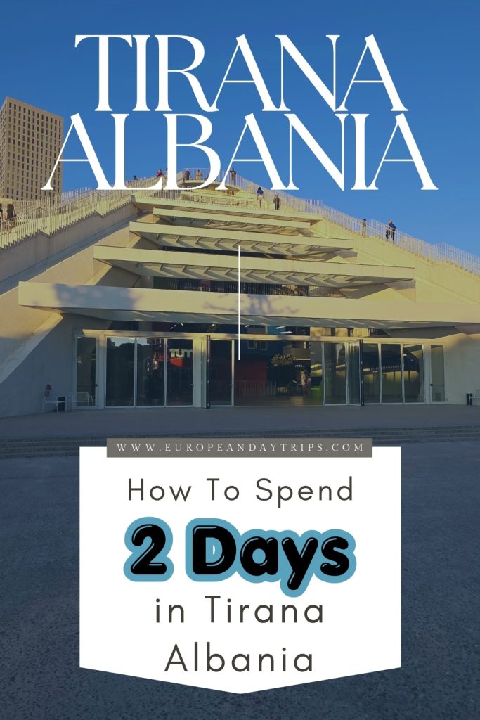 Pinterest pin showing the entrance to a modern tiered building in Tirana under a blue sky. The text reads "TIRANA ALBANIA" and "WWW.EUROPEANDAYTRIPS.COM How To Spend 2 Days in Tirana Albania."